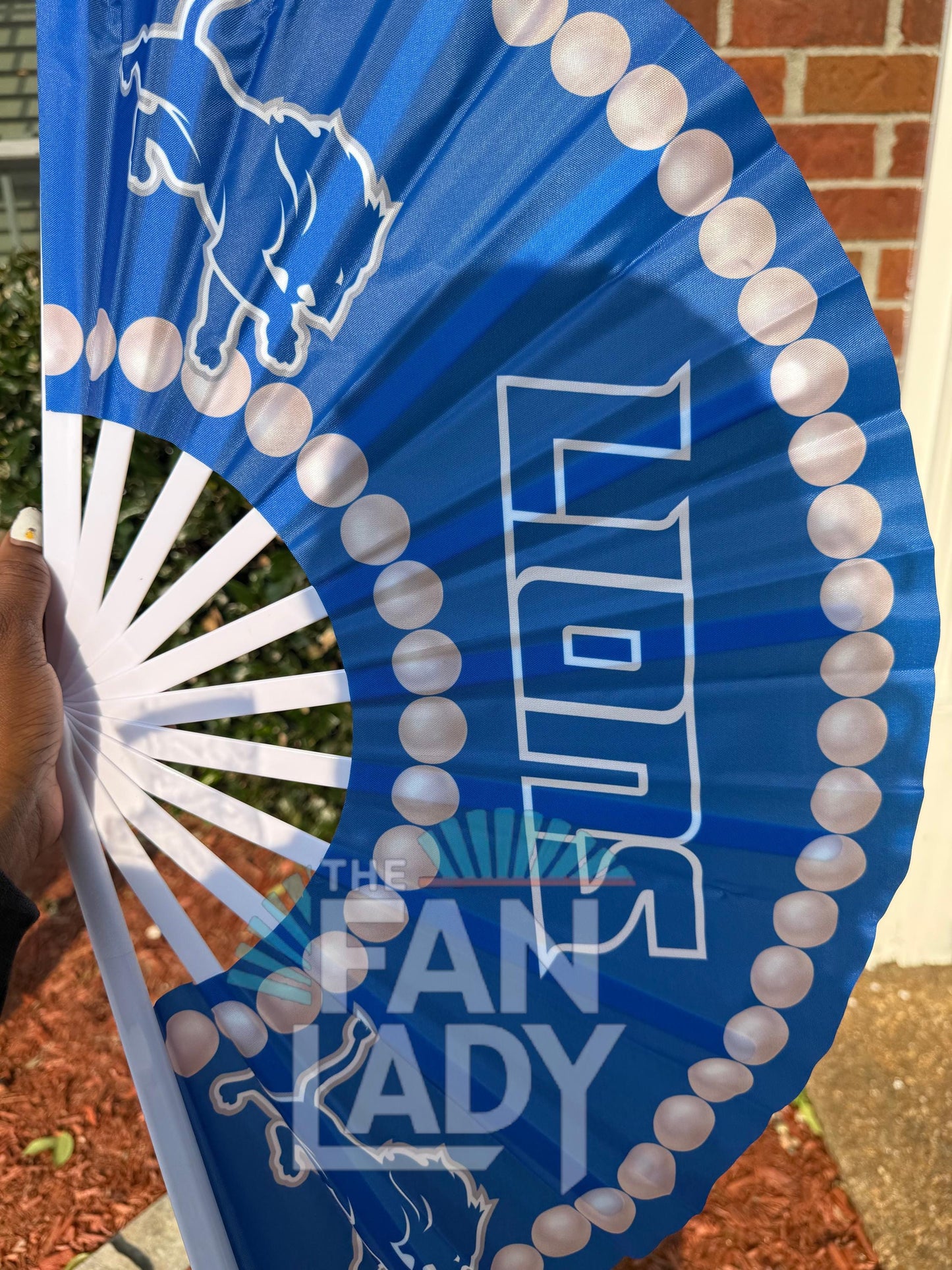 Detroit Lions Clack Fan: Game Day Accessory with Pearl Trim
